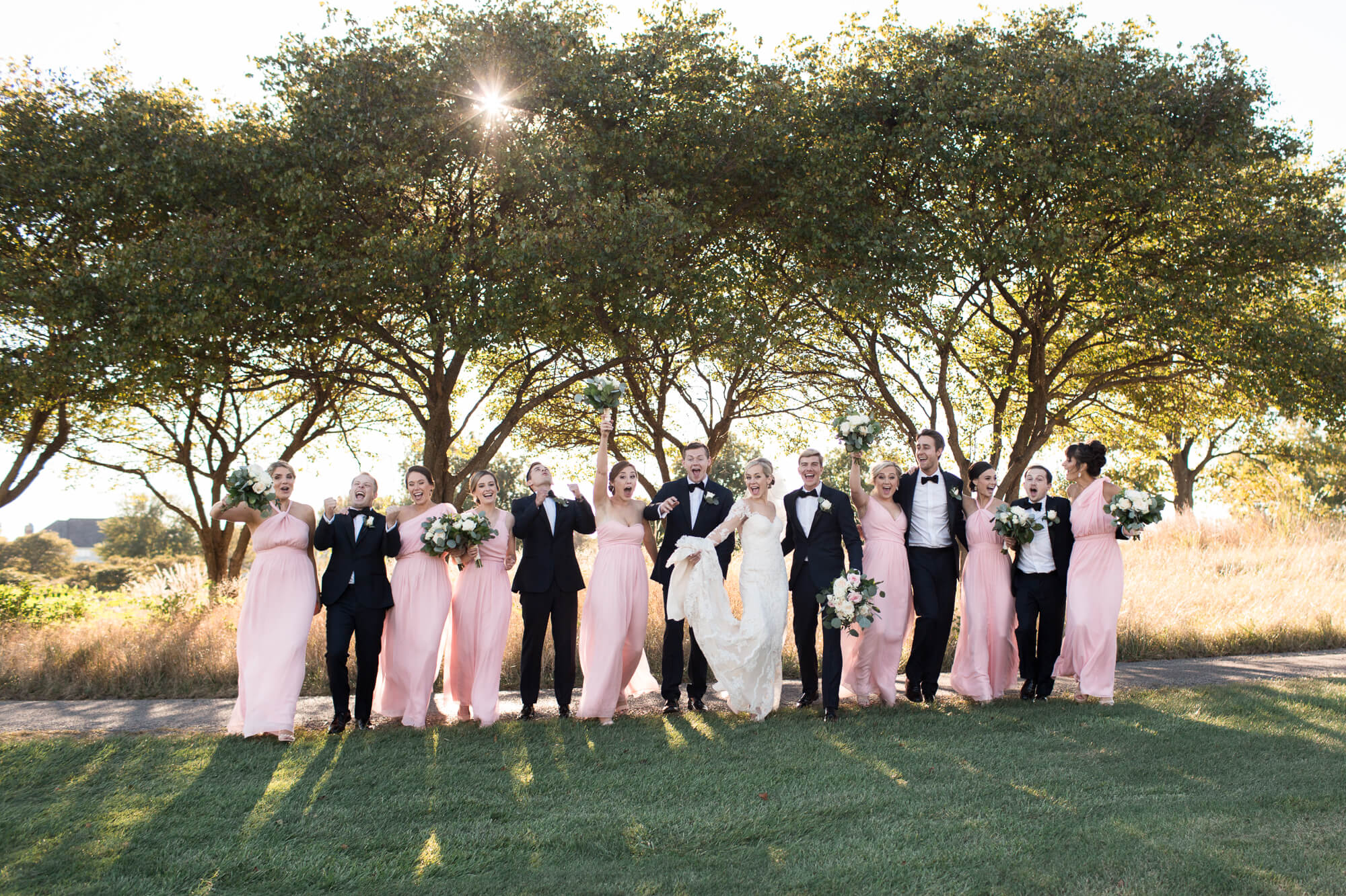 beautiful picture of the bride and groom with their bridesmaid and groomsman by elle rose photo