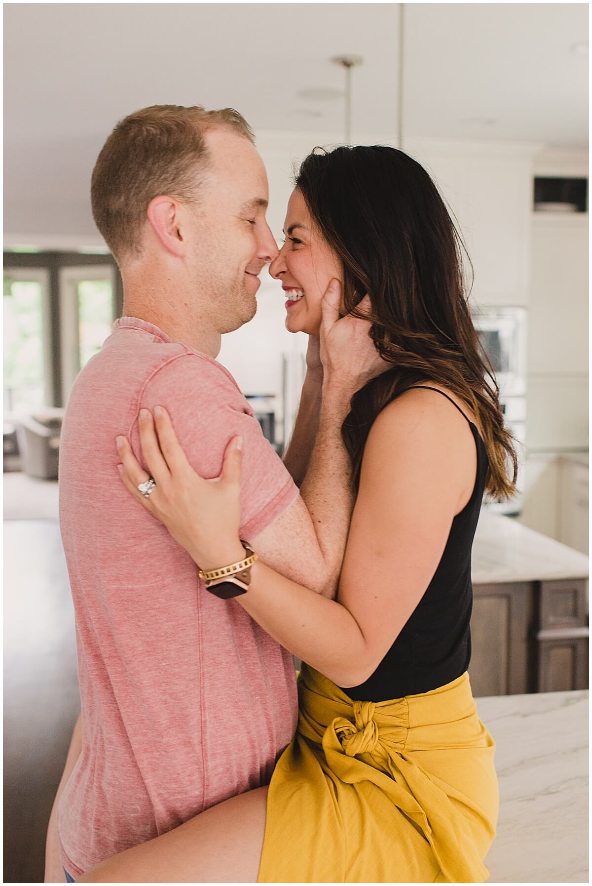 Mom and dad sitting on the kitchen counter Face to Face by Oahu lifestyle photographer